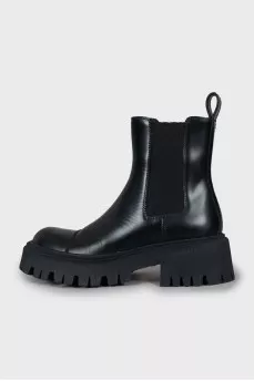 Black boots with a textured sole