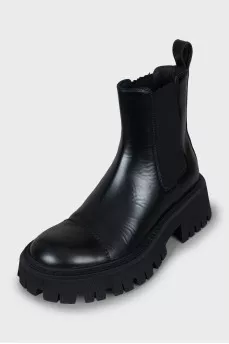 Black boots with a textured sole