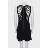 Fitted dress with back decoration