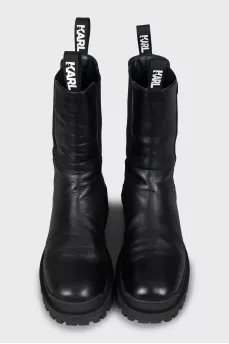 Leather boots decorated with logo