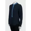 Blue silk blouse with a loose fit