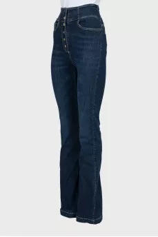 Flared jeans with gold studs