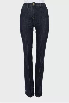 Blue flared jeans with stitched creases