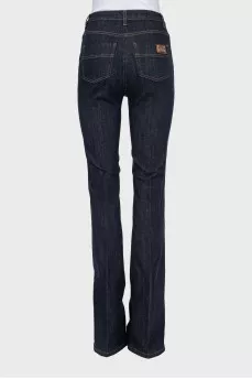 Blue flared jeans with stitched creases