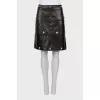 Leather skirt with metal decor