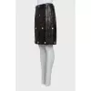 Leather skirt with metal decor