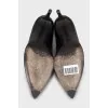 Leather shoes with ties at the back