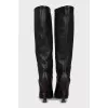 Leather boots with a figured heel