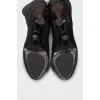 Leather boots with a figured heel