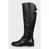 Black leather boots with low heels