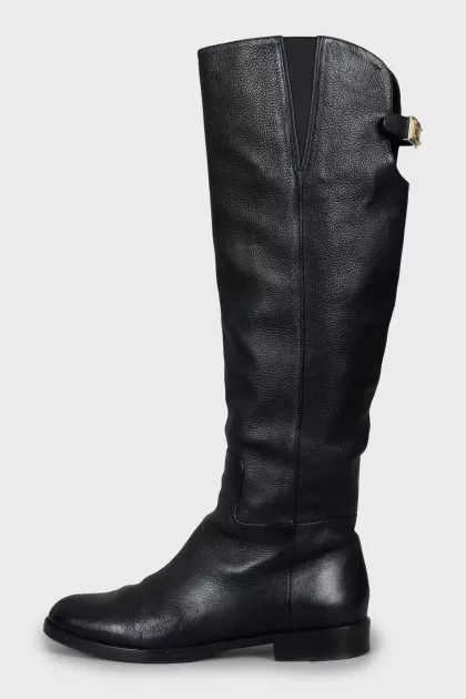 Black leather boots with low heels