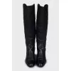Black leather boots with low heels