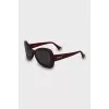 Red sunglasses with logo