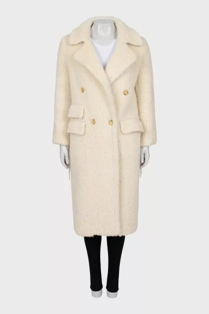 Double-breasted fur coat with fringe