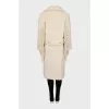 Double-breasted fur coat with fringe