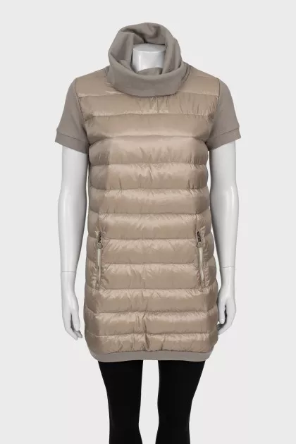 Quilted vest with a high neck