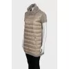 Quilted vest with a high neck