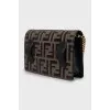 Leather bag with golden logo