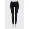 Skinny jeans with leather inserts
