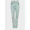 Jeans decorated with zippers