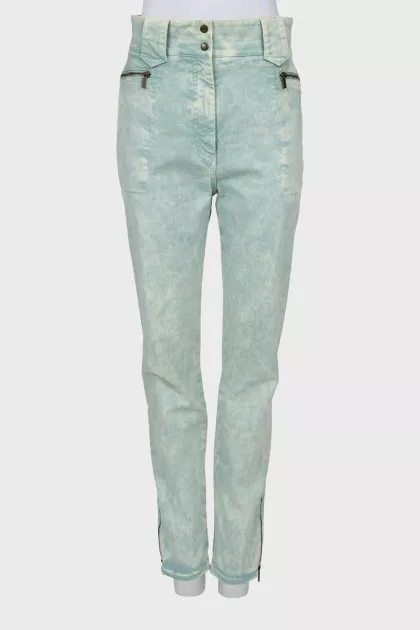 Jeans decorated with zippers