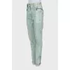 Jeans decorated with zippers