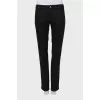 Dark grey trousers with arrows
