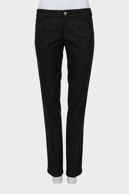 Dark grey trousers with arrows