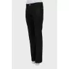 Dark grey trousers with arrows