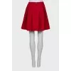 Red pleated skirt