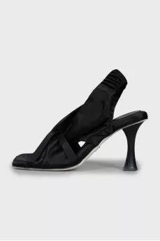 Textile sandals with a figured heel