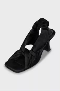 Textile sandals with a figured heel