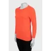 Knitted jumper in orange color