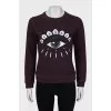 Purple sweatshirt with embroidered print