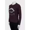 Purple sweatshirt with embroidered print