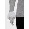 Wool turtleneck with ruffles on the sleeves