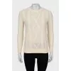 Merino wool sweater with fringe