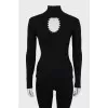 Black ribbed turtleneck with cutout