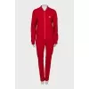 Red tracksuit with arrows