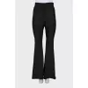 Flared trousers with stitched creases
