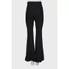 Flared trousers with stitched creases