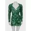 Green dress embroidered with sequins
