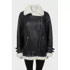 Oversized black and white sheepskin coat