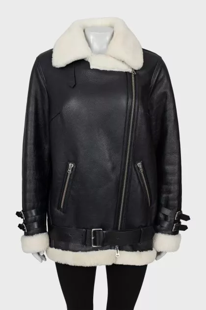 Oversized black and white sheepskin coat