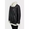 Oversized black and white sheepskin coat