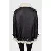 Oversized black and white sheepskin coat