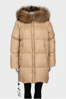Down jacket with fur on the hood and a tag