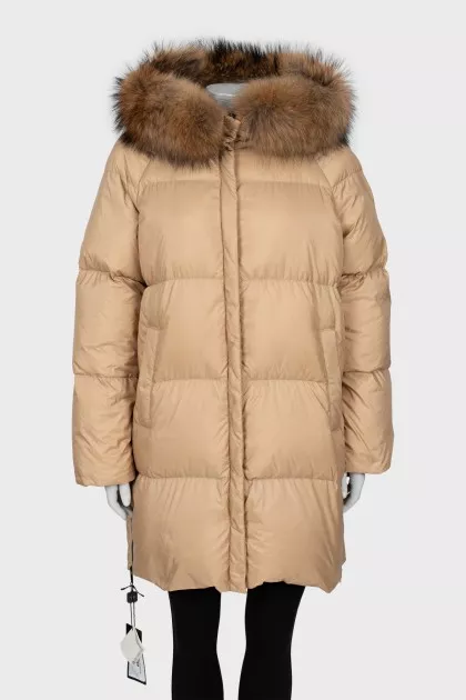 Down jacket with fur on the hood and a tag