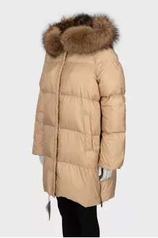 Down jacket with fur on the hood and a tag
