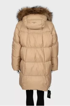 Down jacket with fur on the hood and a tag